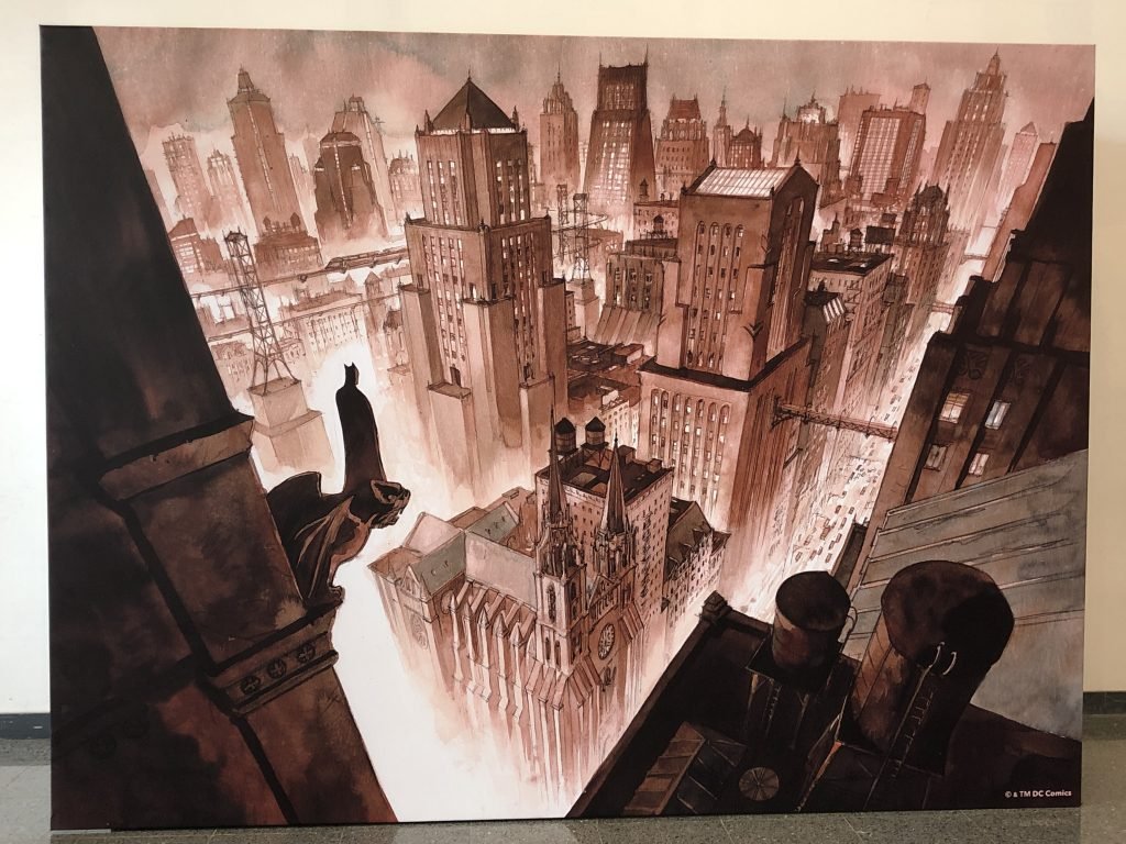 Peli o Manta. Viviendo (en) el saló del cómic. Mural Batman.